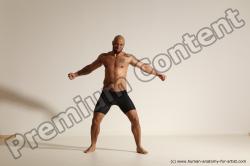 Underwear Gymnastic poses Man Black Muscular Bald Dancing Dynamic poses Academic